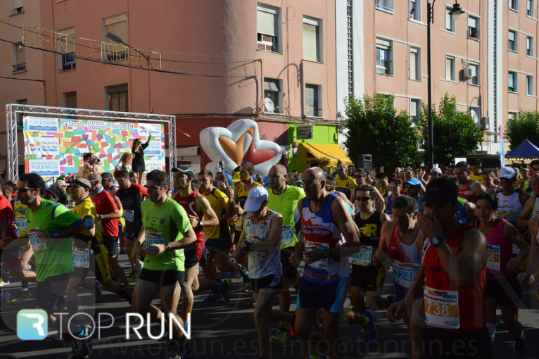 Oumellal y Landín triunfan en la media maratón de Alzira